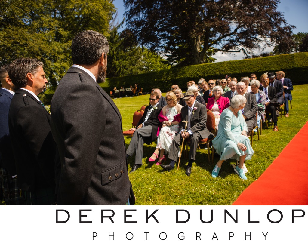 Outdoor ceremony red carpet Mabie House