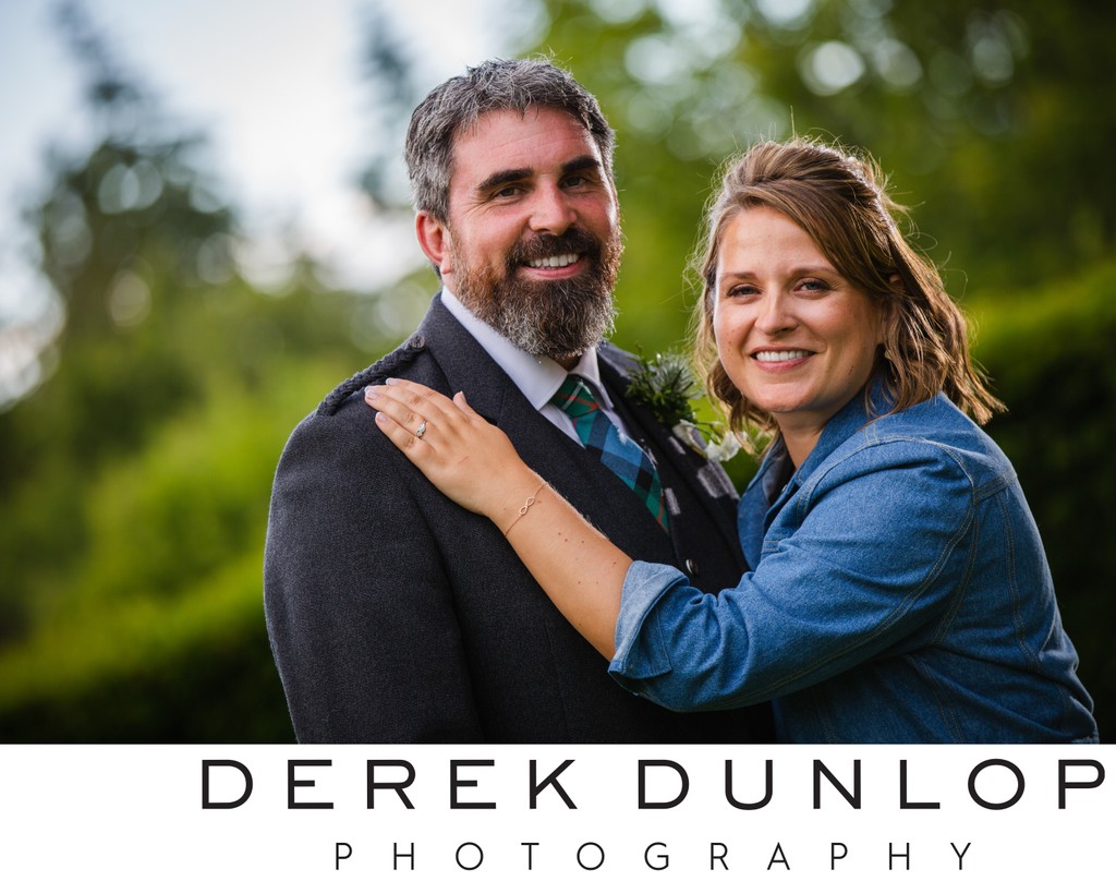 Couple hug portrait Mabie House garden