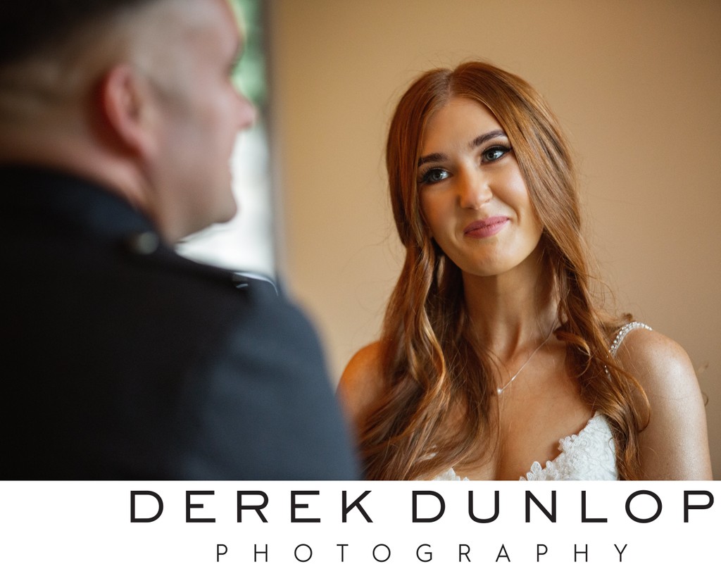 Bride smiling at groom ceremony Brig o Doon