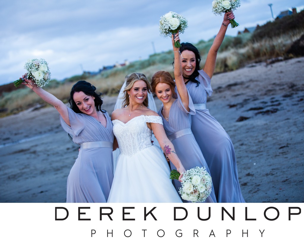 Bridesmaids celebrating Troon beach wedding