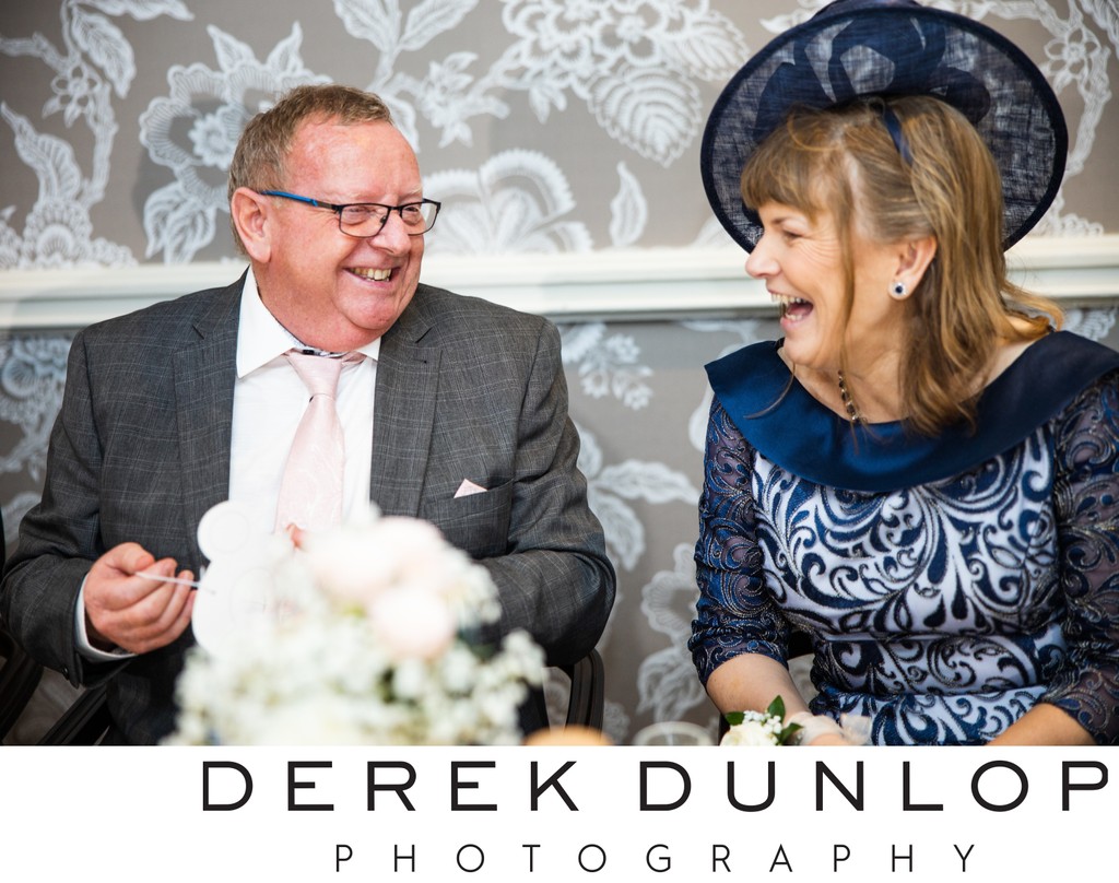 Parents of the couple laughing Marine Troon