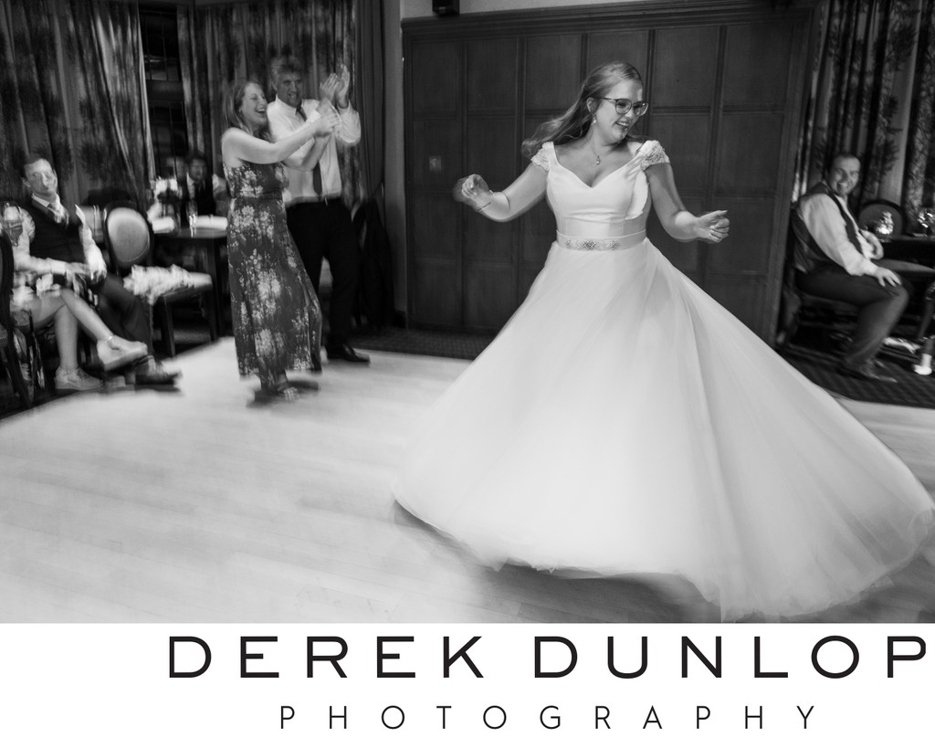 bride twirling on the dance floor at piersland house hotel