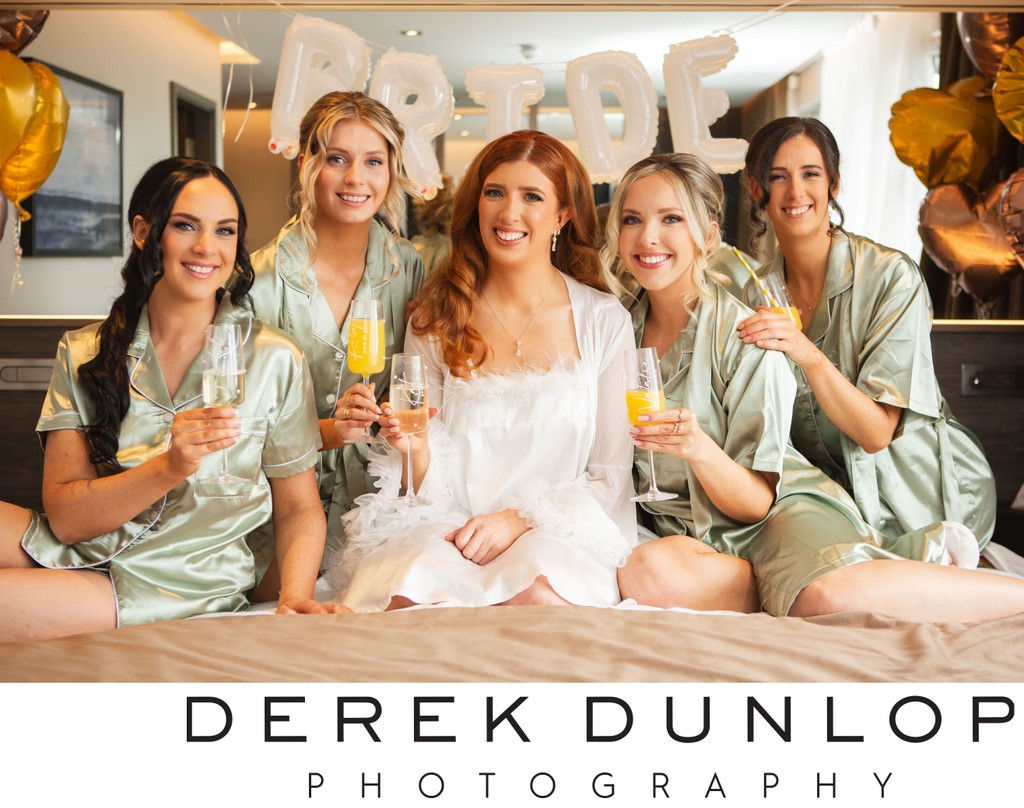 bride with bridal party in their wedding pajamas