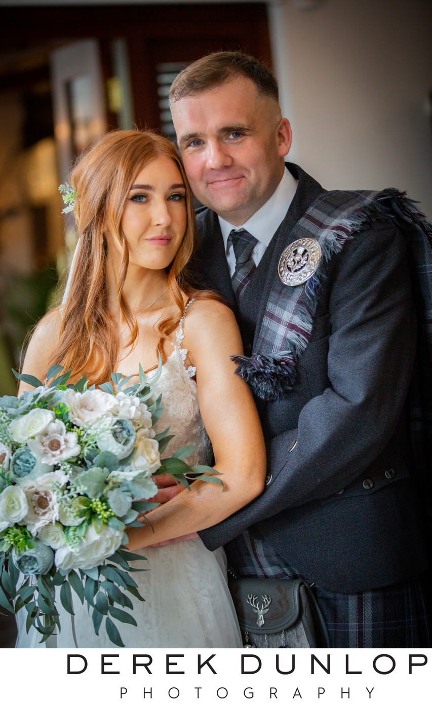 Newlyweds close portrait Brig o Doon