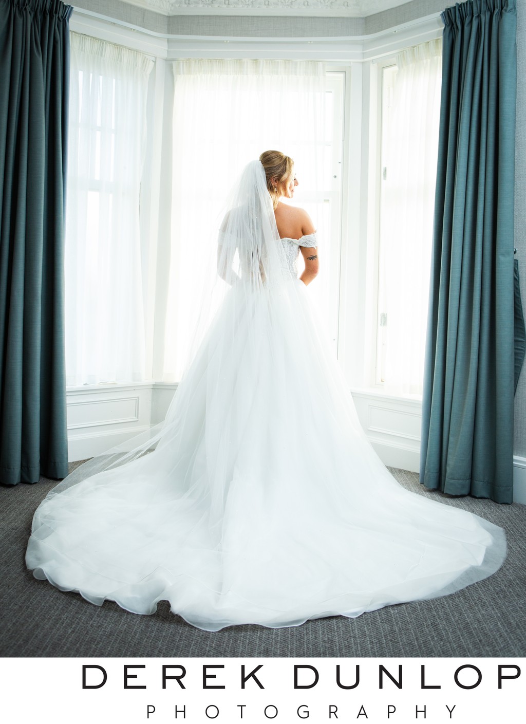 marine hotel bride at the window