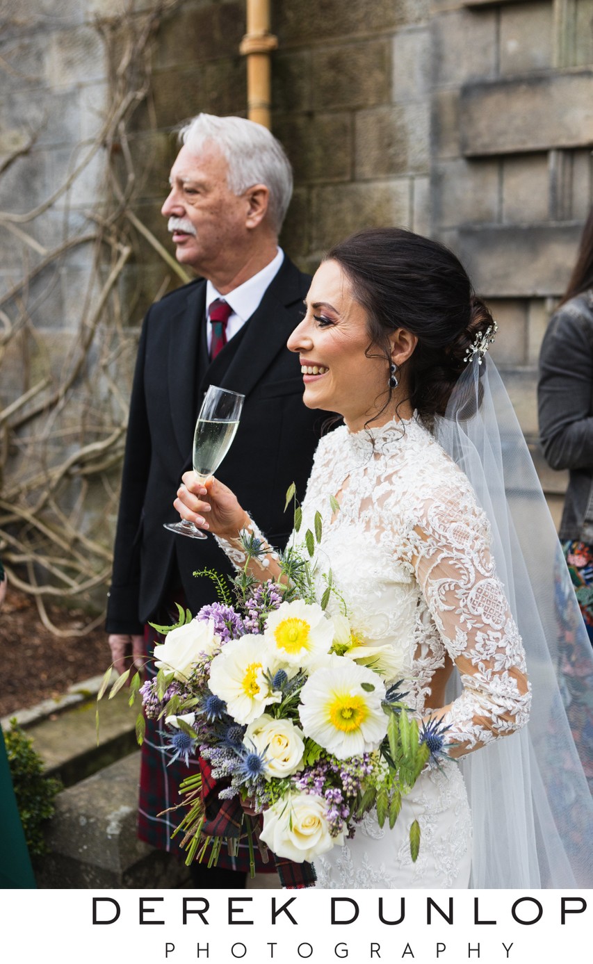 Bride champagne laugh Pollok House garden