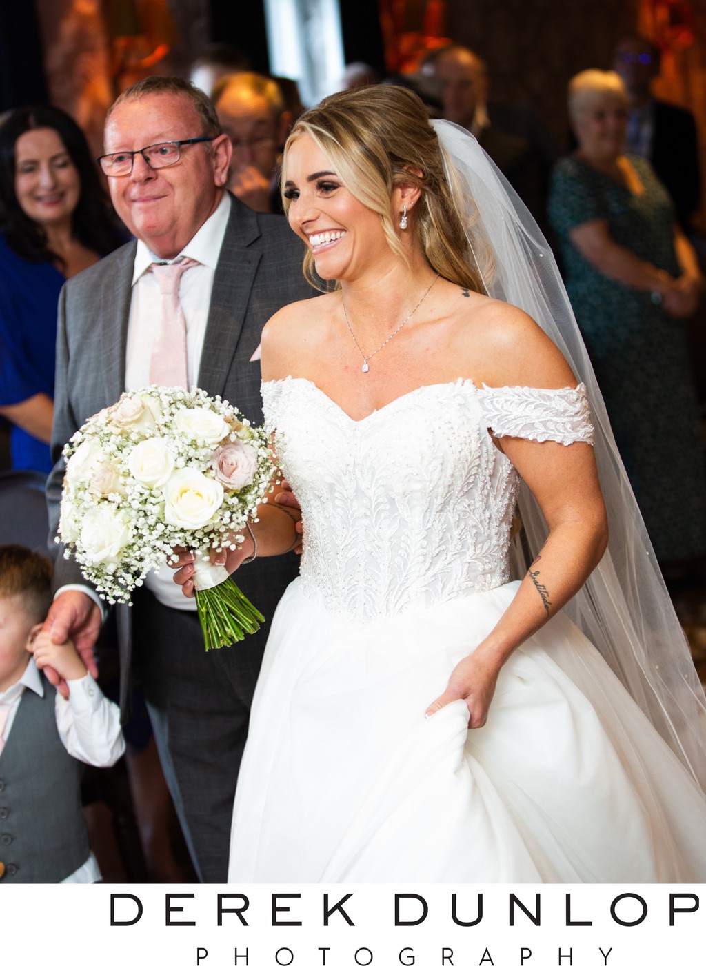 Bride and father walking down the aisle Marine Troon