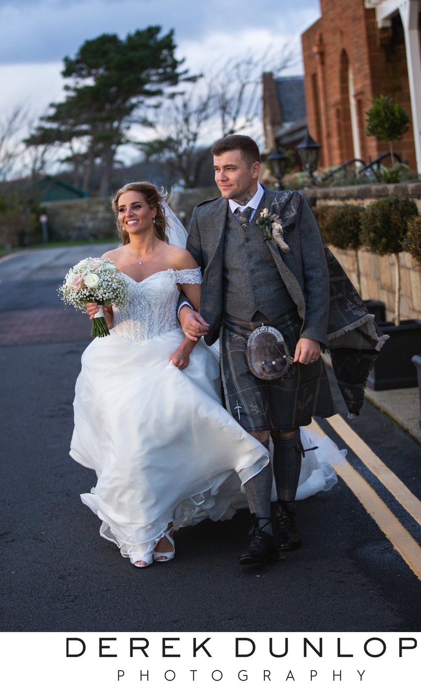 Newlyweds stroll Troon seafront