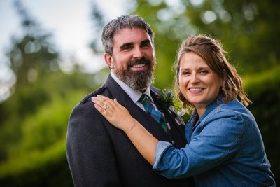 Couple hug portrait Mabie House garden