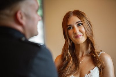 Bride smiling at groom ceremony Brig o Doon