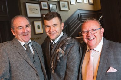 Groom and dads laughing Marine Troon