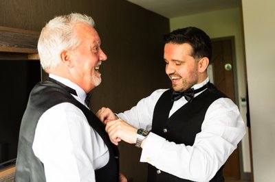 redhurst-hotel-groom with father - having a moment 