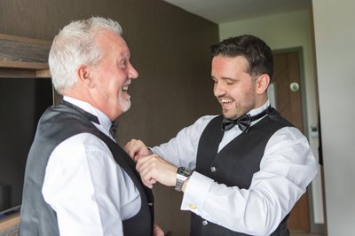 redhurst-hotel-groom with father - having a moment 