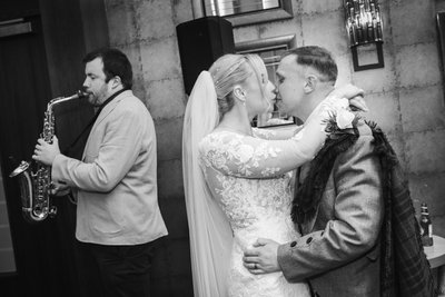 First Kiss with Saxophone — Radstone Wedding