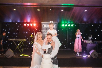 Radstone Cake Cutting — Daughter on Shoulders