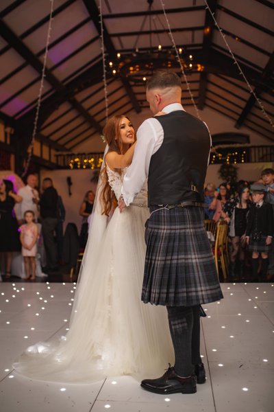 First dance embrace Brig o Doon