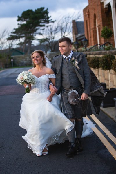 Newlyweds stroll Troon seafront