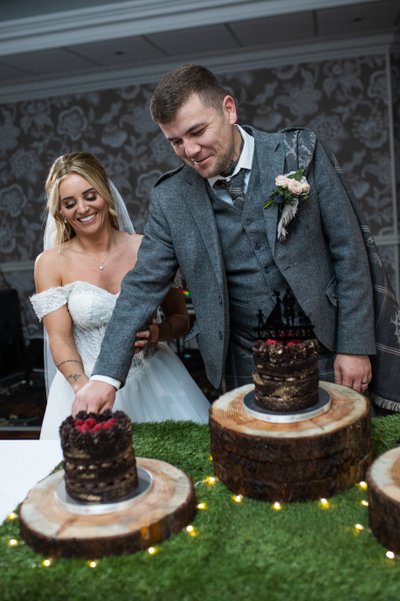 Wedding cake cutting Marine Hotel Troon