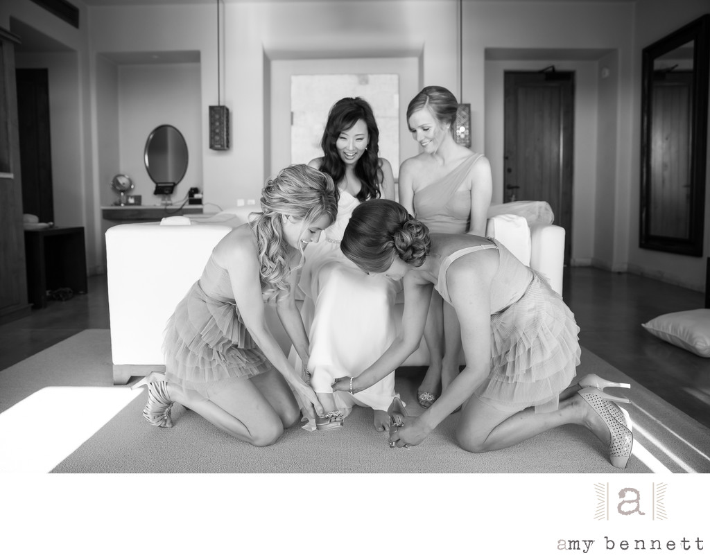 How many bridesmaids does it take to put on a shoe?