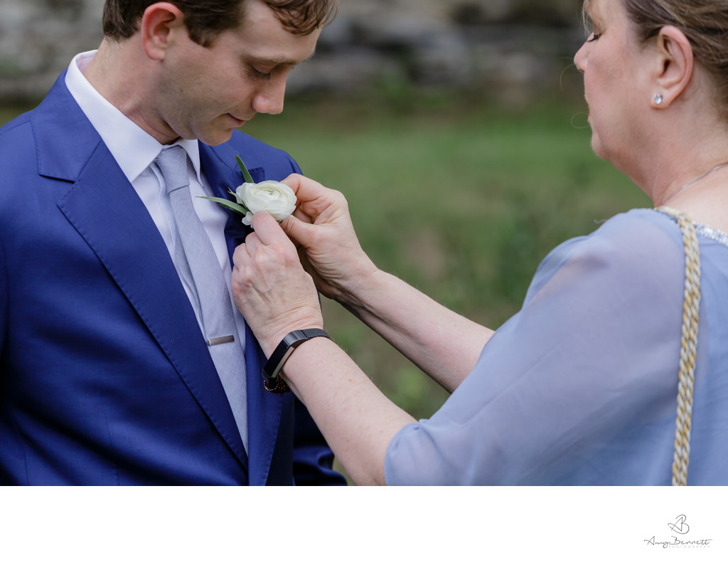 Mother of the Groom Affixes Boutonniere