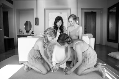 How many bridesmaids does it take to put on a shoe?