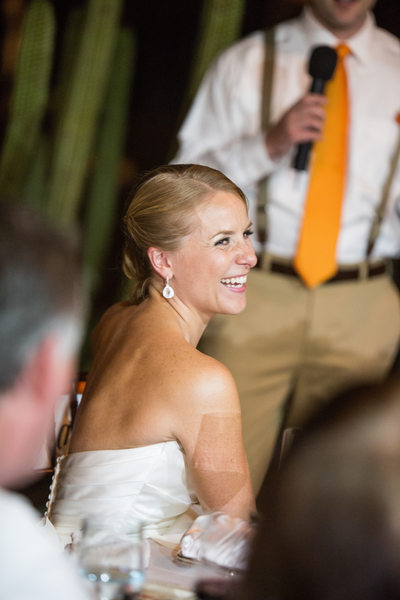 Bride Laughing During Best Man Speech