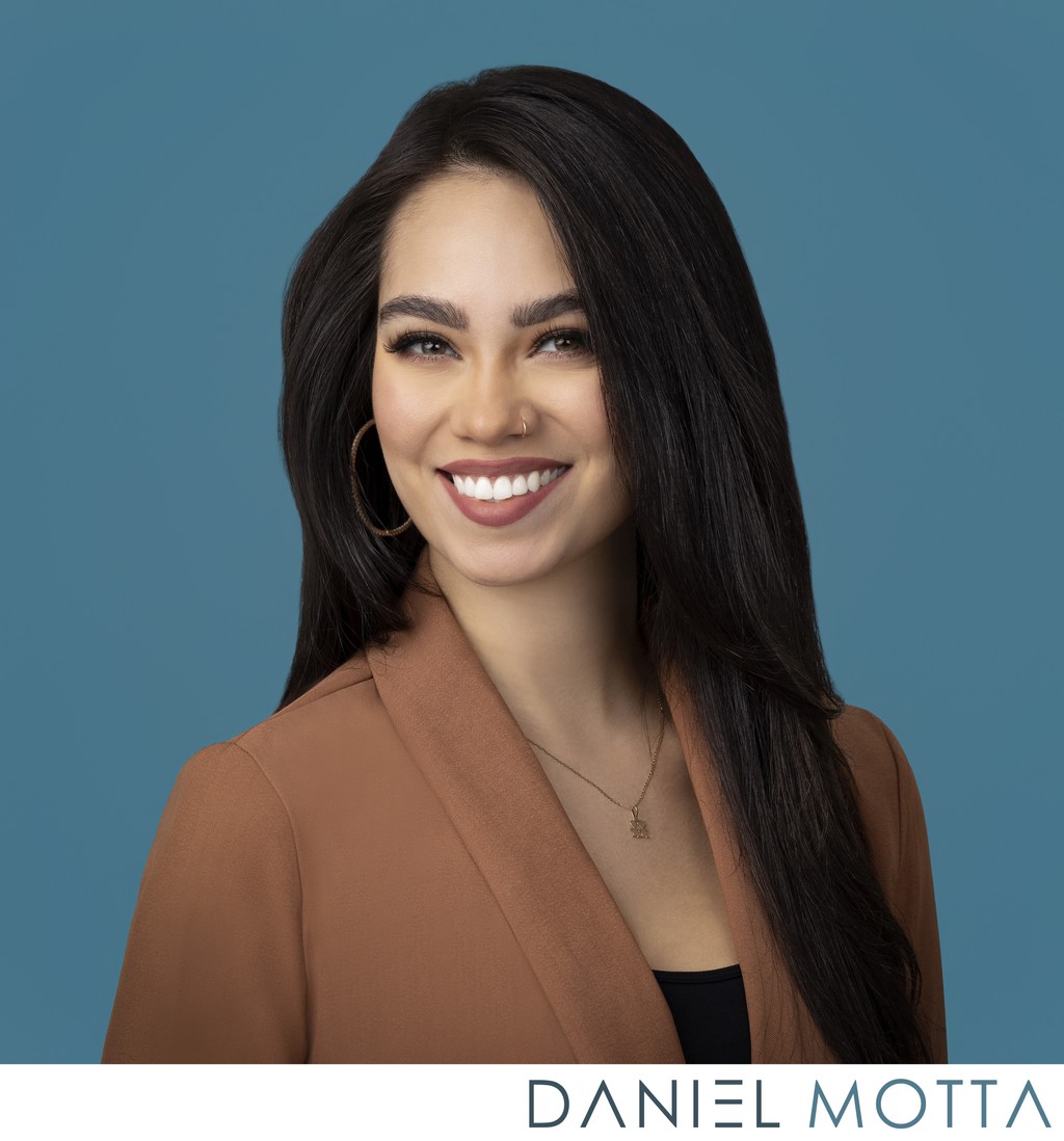 Professional Headshot with Cool Blue Background – Dallas Businesswomen