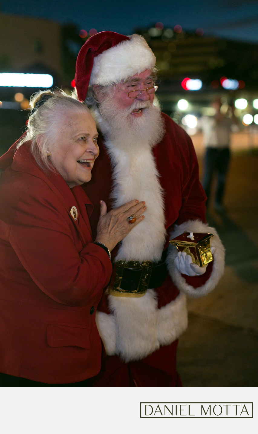 CEO of Ebby Halliday Laughs with Santa Claus