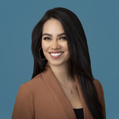 Professional Headshot with Cool Blue Background – Dallas Businesswomen