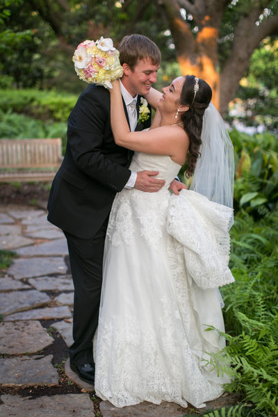 Dallas Photograph of Newlyweds Laughing at Wedding