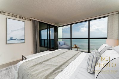 digitally furnished ocean front condo bedroom