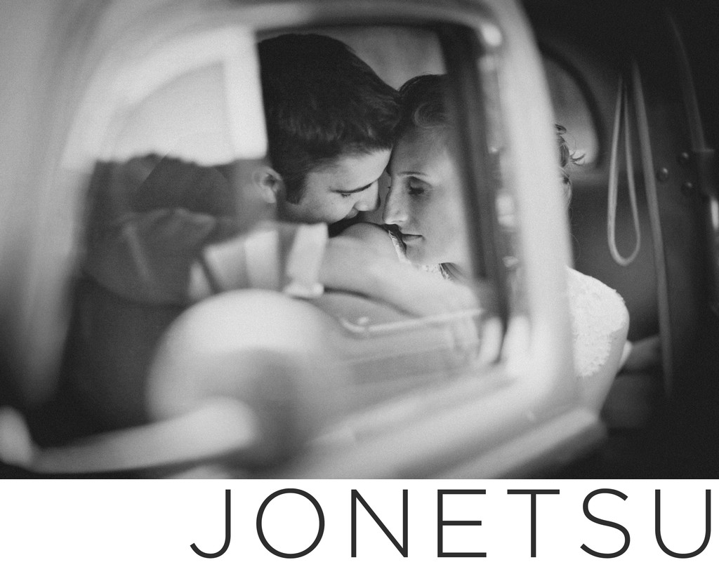 Vintage car wedding portrait intimate black and white