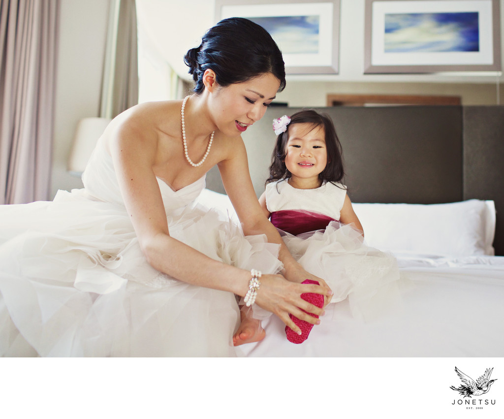 Bride with flower girl at the Loden Hotel Penthouse