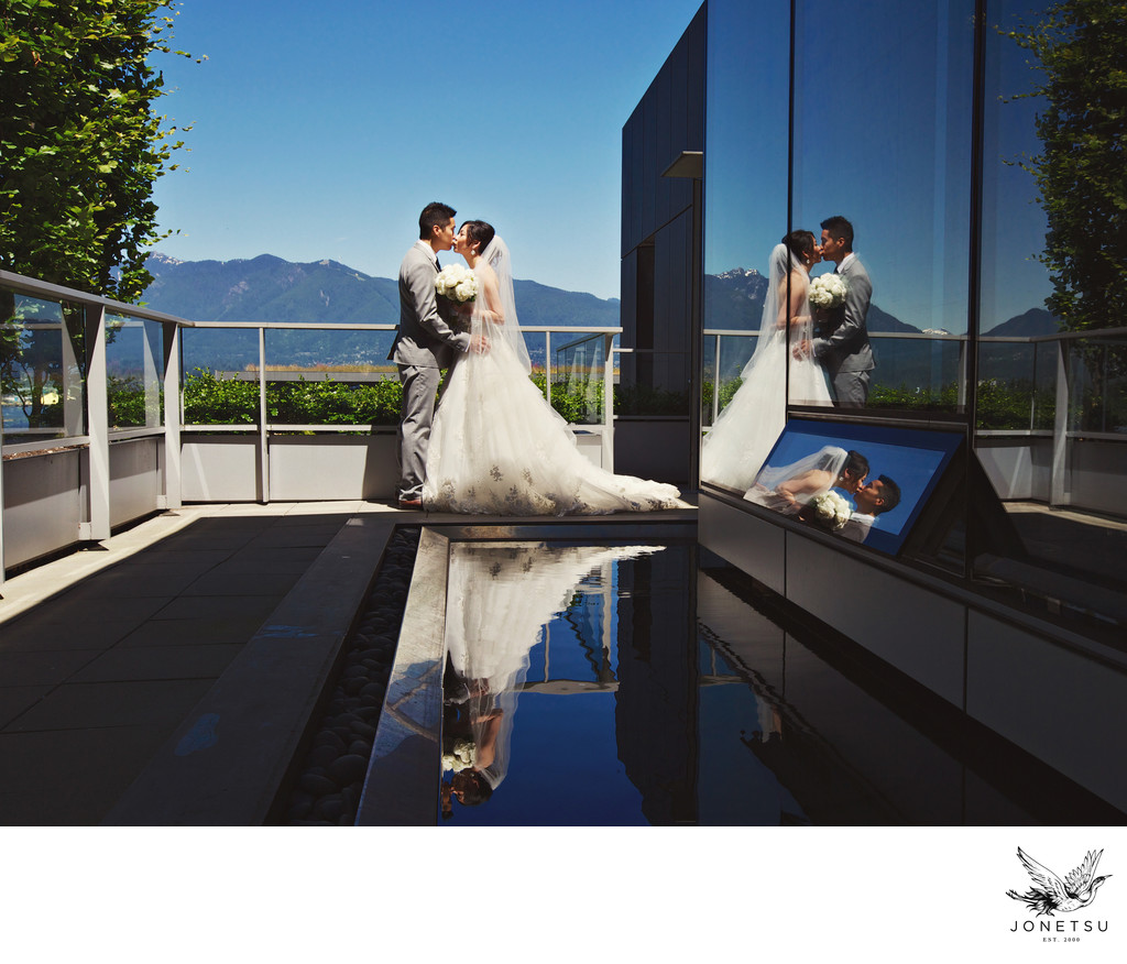 Reflections of bride and groom at Pac Rim Chairman's