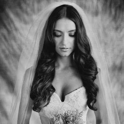 Quiet bridal portrait with classic backdrop