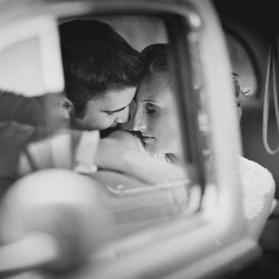 Vintage car wedding portrait intimate black and white