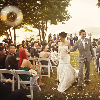 Brock House outdoor wedding aisle recessional with bubbles