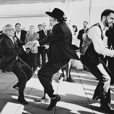 Vancouver Jewish wedding photographer hora fun