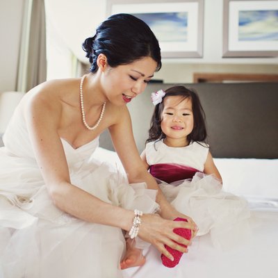Bride with flower girl at the Loden Hotel Penthouse
