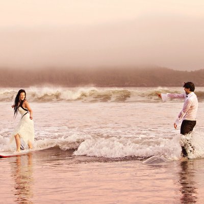 Surfing wedding couple photo