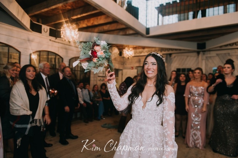 Bride with Bouquet at Barn Wedding
