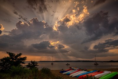 Storm Clouds and God Rays Sunbeams at Beach Northport NY Nature and Travel Photography