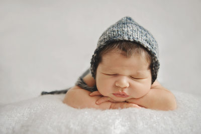 Baby in blue and white beanie 