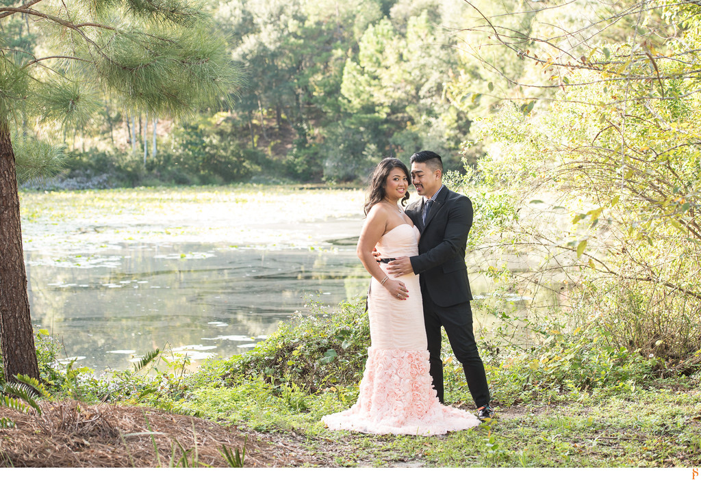 LONG PINK DRESS AND SUIT FOR ENGAGEMENT PHOTOS IN A PARK