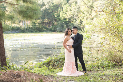LONG PINK DRESS AND SUIT FOR ENGAGEMENT PHOTOS IN A PARK