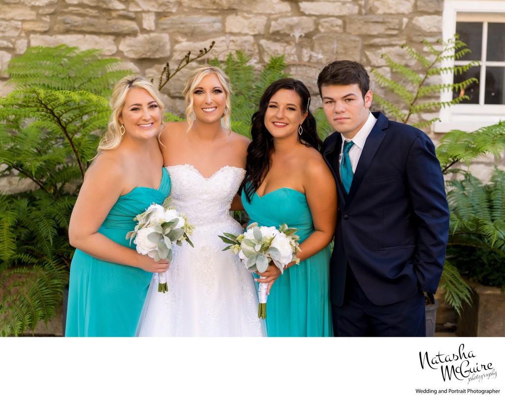 Bride with siblings at Stone House of St Charles