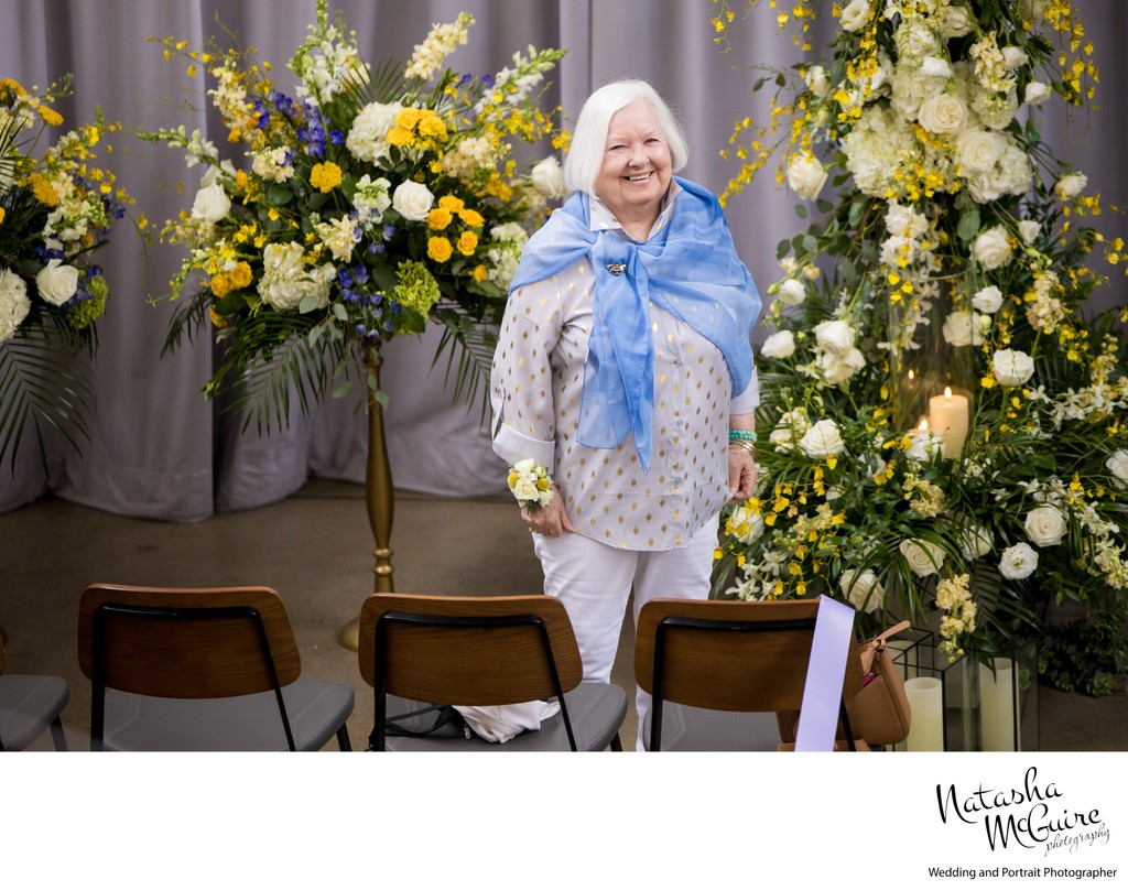 Mother of the bride at ceremony candid photo