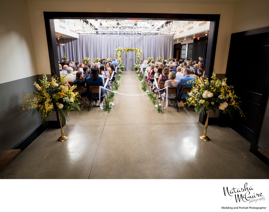 Ceremony location with guests Olive and Oak The Hall