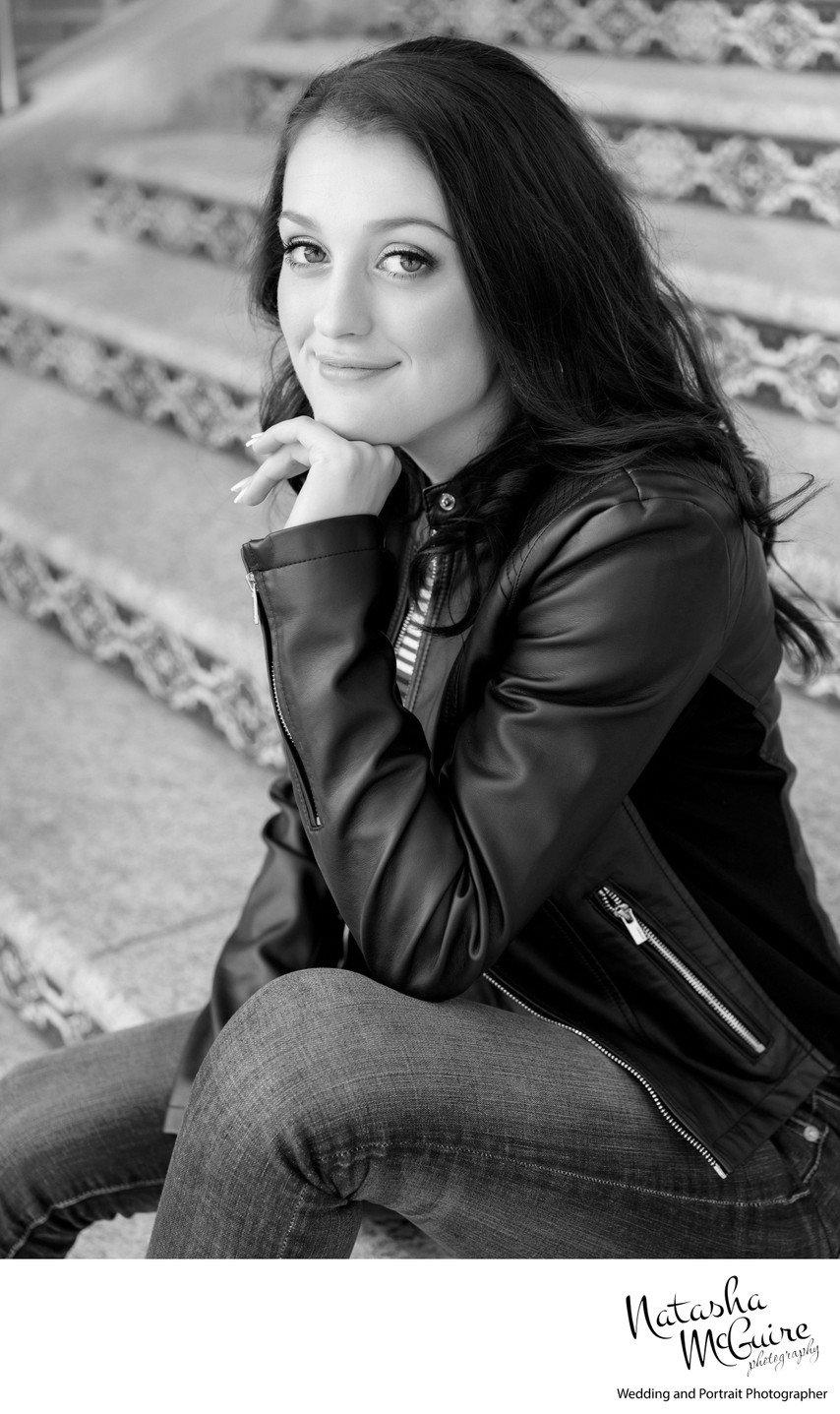 senior girl on steps black and white image