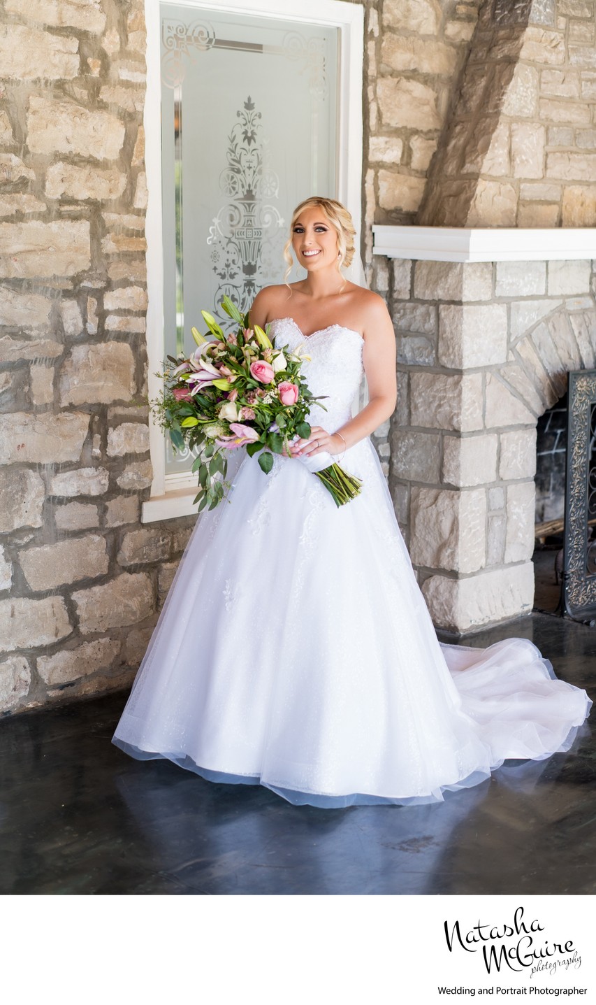 Full length photo of bride at bridal suite